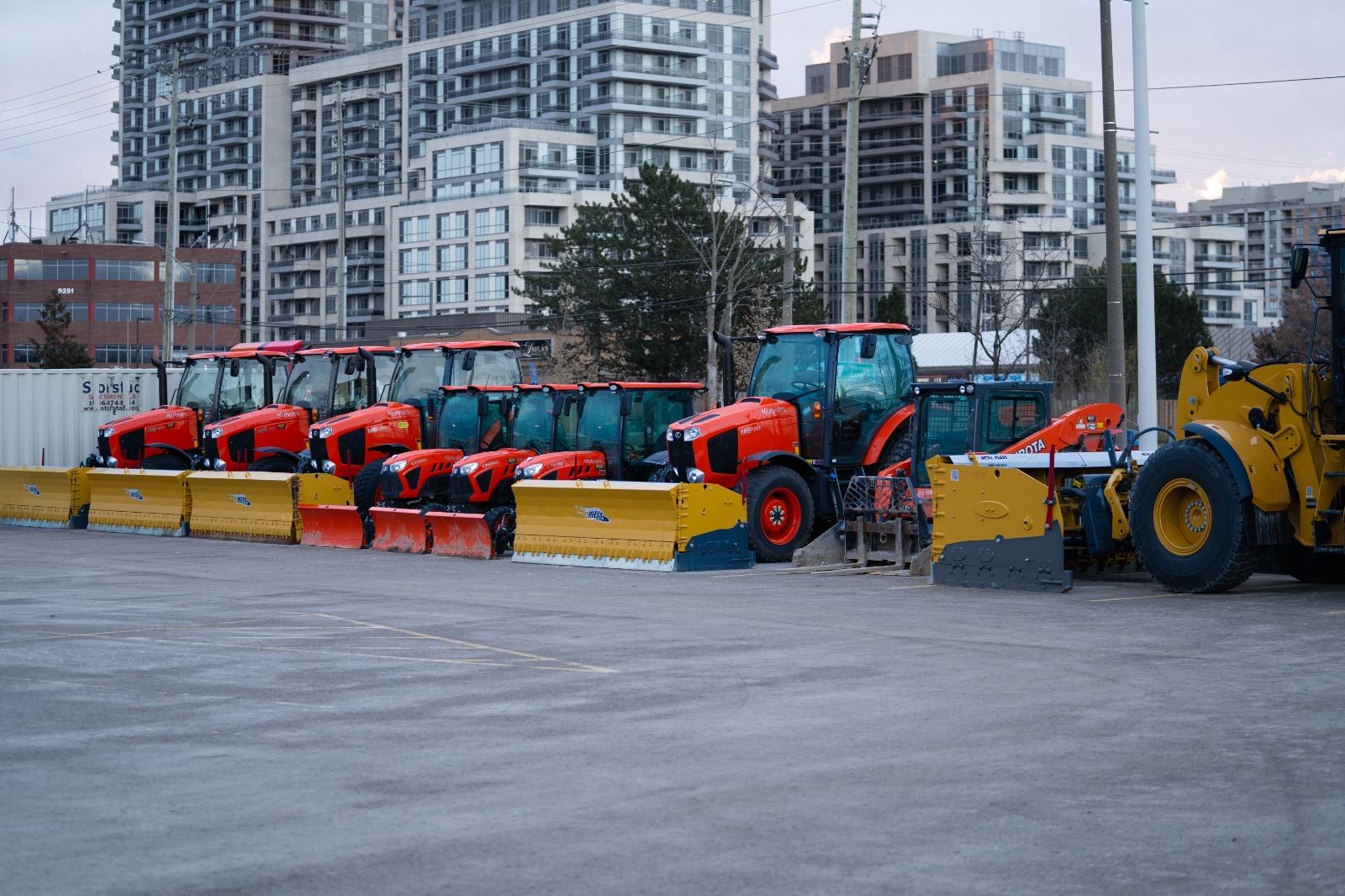 Spartan Snow Removal fleet of loaders, tractors and trucks staged for winter service